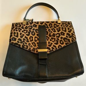 Kate Spade leopard spot purse- shoulder bag with a removable crossbody strap.